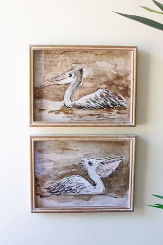 SET OF TWO PELICAN PRINTS UNDER GLASS