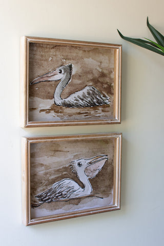 SET OF TWO PELICAN PRINTS UNDER GLASS