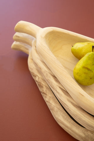 SET OF THREE PEAR-SHAPED CARVED WOOD BOWLS