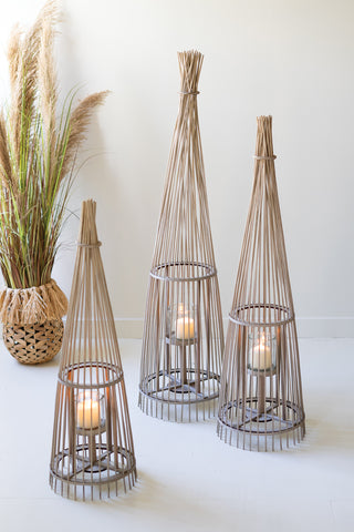 SET OF THREE GREY RATTAN LANTERNS WITH GLASS INSERTS