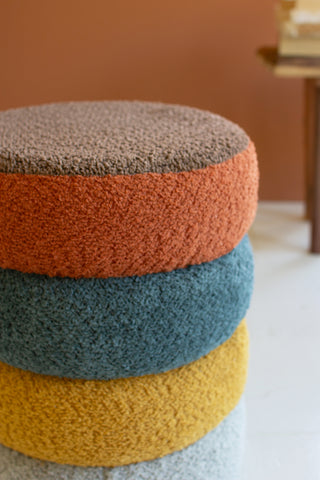 MULTI COLOR STACKED CARPET POUF