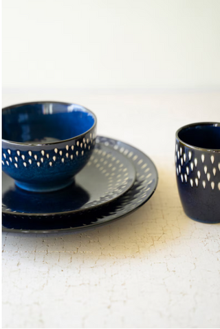 SET OF FOUR BLUE AND WHITE CERAMIC MUGS