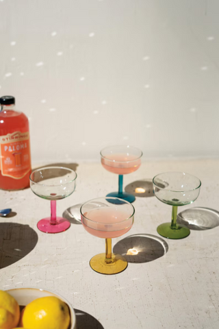 SET OF FOUR COUPE GLASSES WITH COLORED STEMS - ONE EACH