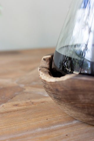 BLOWN GLASS BOTTLE ON TEAKWOOD BASE