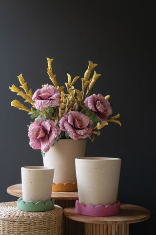 SET OF THREE SCALLOPED TERRACOTTA PLANTERS