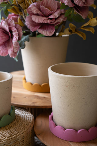 SET OF THREE SCALLOPED TERRACOTTA PLANTERS