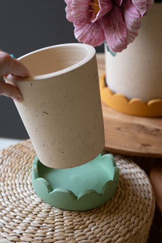 SET OF THREE SCALLOPED TERRACOTTA PLANTERS