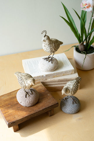 SET OF THREE CLAY QUAIL ON RIVER ROCK BASES