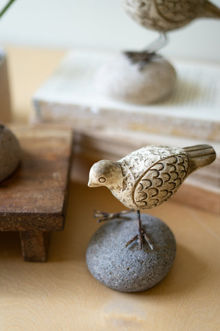 SET OF THREE CLAY QUAIL ON RIVER ROCK BASES