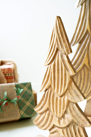 SET OF THREE CARVED WOODEN CHRISTMAS TREES ON BASES - NATURAL WITH GOLD DETAIL