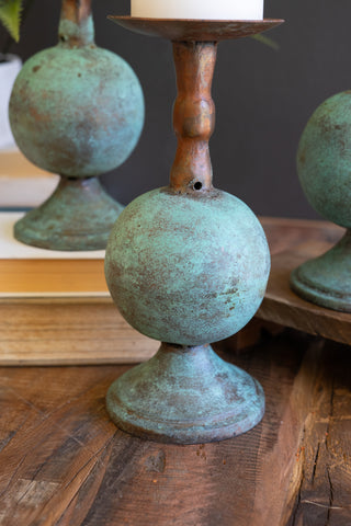 SET OF THREE COPPER PATINA FINISH PILLAR CANDLE HOLDERS