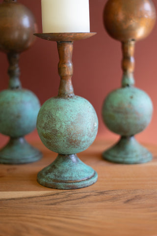 SET OF THREE COPPER PATINA FINISH PILLAR CANDLE HOLDERS