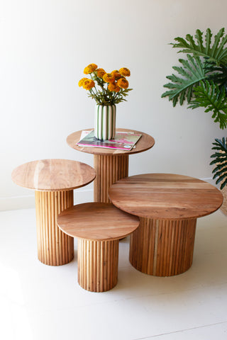 SET OF FOUR ACACIA WOOD ACCENT TABLES WITH TAMBOUR BASES