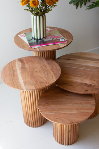 SET OF FOUR ACACIA WOOD ACCENT TABLES WITH TAMBOUR BASES