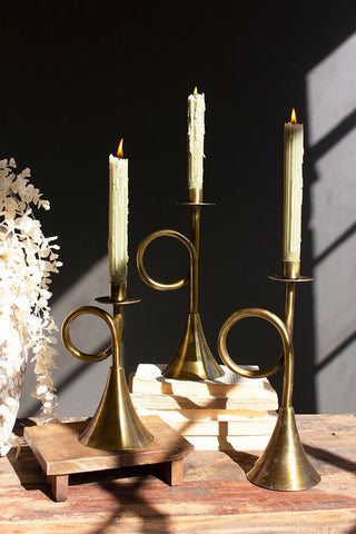 SET OF THREE ANTIQUE BRASS TRUMPET TAPER CANDLE HOLDERS