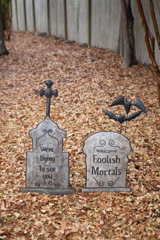 SET TWO HAND-HAMMERED & PAINTED METAL TOMBSTONE YARD STAKES