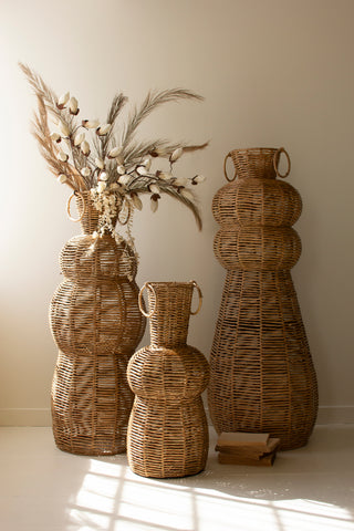 SET OF THREE WOVEN SEAGRASS AND IRON FLOOR VASES