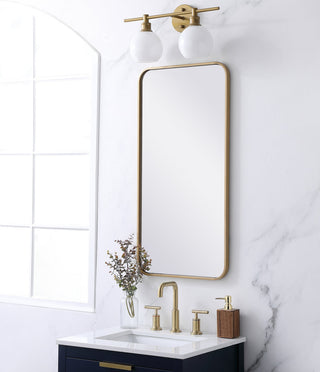 Soft corner metal rectangular mirror 18x36 inch in Brass