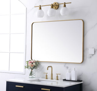 Soft corner metal rectangular mirror 27x40 inch in Brass