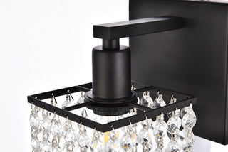 Phineas 1 light bath sconce in black with clear crystals