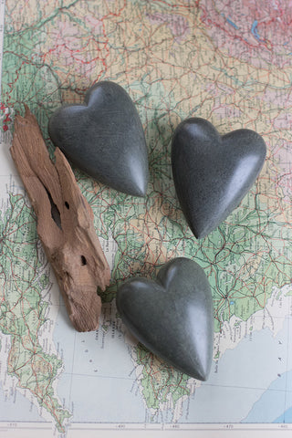 SET OF SIX HAND CARVED STONE HEARTS-DARK GREY