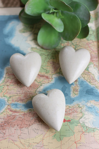 SET OF SIX HAND CARVED STONE HEARTS- WHITE