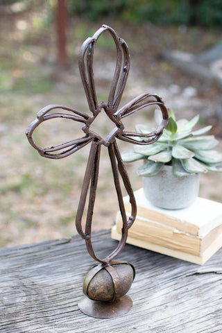 RECYCLED METAL  CROSS ON A CAGED ROCK BASE