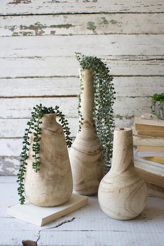 SET OF THREE HAND CARVED TALL WOODEN VASES